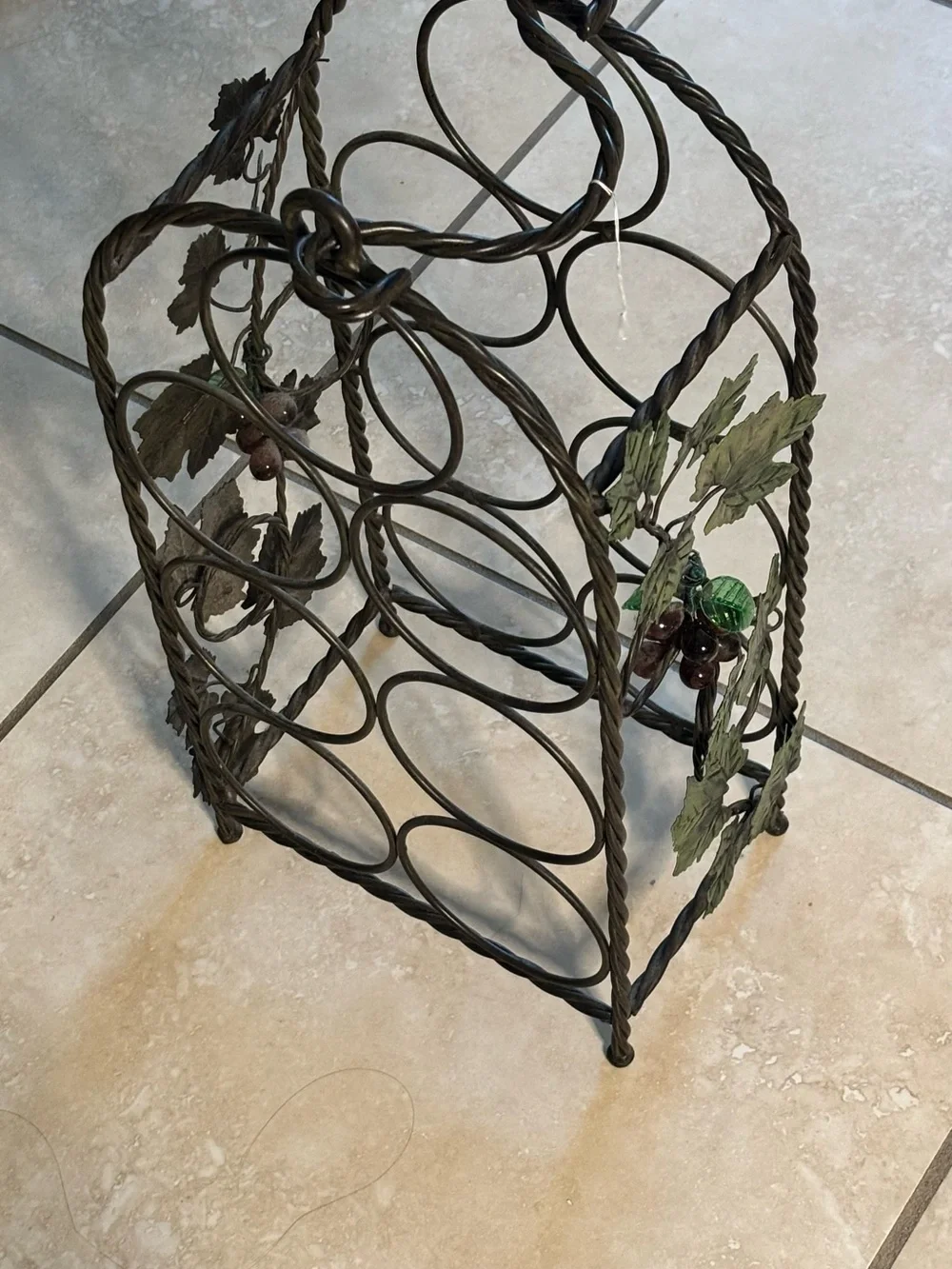Black Metal Wine Bottle Rack with Decorative Leaf Accents
